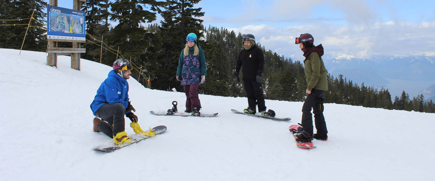snowboard class with instructor and 3 participants
